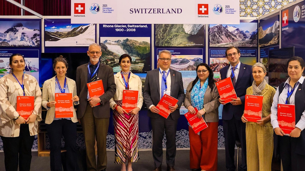 Swiss delegation in front of the Swiss stand at the Glaciers Conference in Dushanbe, Tajikistan
